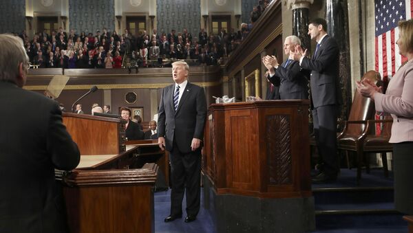 U.S. President Donald Trump is applauded after delivering his first address to a joint session of Congress from the floor of the House of Representatives iin Washington, U.S., February 28, 2017 - Sputnik International