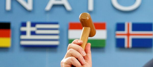 NATO Secretary-General Jens Stoltenberg holds up a ceremonial hammer at the start of a NATO-Georgia defence ministers meeting at the Alliance headquarters in Brussels, Belgium February 16, 2017. - Sputnik International