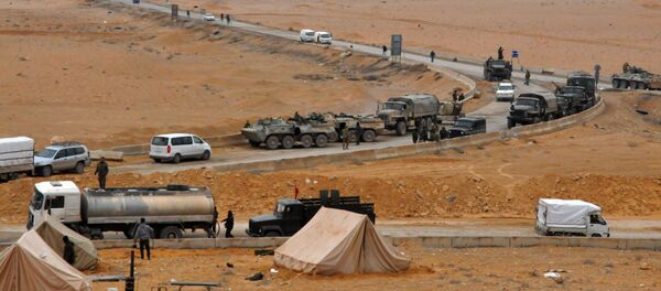 Syrian regime fighters take position as they advance to retake the ancient city of Palmyra, from Islamic State (IS) group fighters on March 2, 2017 Syrian regime fighters take position as they advance to retake the ancient city of Palmyra, from Islamic State (IS) group fighters on March 2, 2017 - Sputnik International