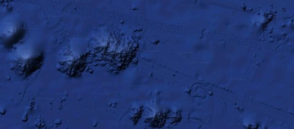 A 2.5 mile long object found at the bottom of the Pacific Ocean, with a 40-mile track trailing behind it. A 2.5 mile long object found at the bottom of the Pacific Ocean, with a 40-mile track trailing behind it. - Sputnik International