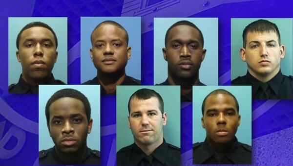 Seven Baltimore police officers arrested for falsely detaining, robbing and extorting their victims. - Sputnik International