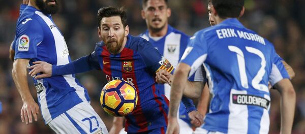 Football Soccer - Barcelona v Leganes - Spanish La Liga Santander - Camp Nou stadium, Barcelona, Spain - 19/02/17 - Barcelona's Lionel Messi in action against Leganes' Dimitris Siovas. - Sputnik International
