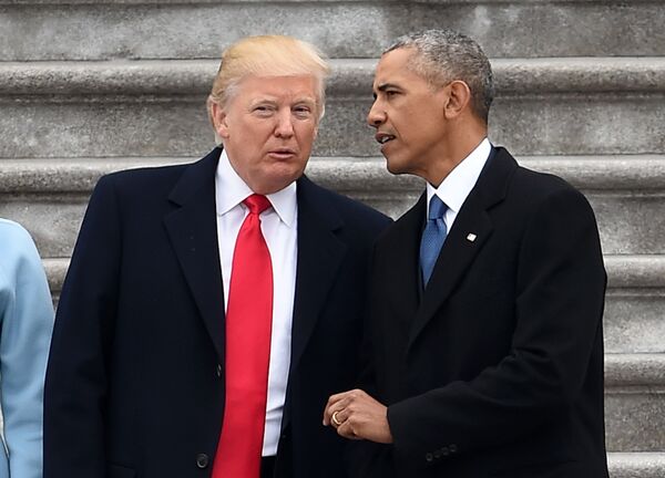 President Donald Trump and former President Barack Obama talk on the East front steps of the US Capitol after inauguration ceremonies on January 20, 2017 in Washington, DC. - Sputnik International