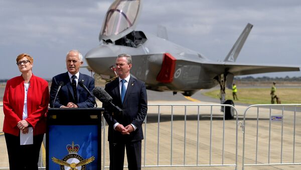 Australian Prime Minister Malcolm Turnbull speaks next to Minister for Defence, Senator Marise Payne and Minister for Defence Industry, Christopher Payne. - Sputnik International