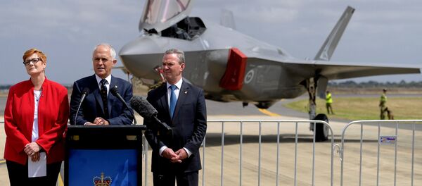 Australian Prime Minister Malcolm Turnbull speaks next to Minister for Defence, Senator Marise Payne and Minister for Defence Industry, Christopher Payne. Australian Prime Minister Malcolm Turnbull speaks next to Minister for Defence, Senator Marise Payne and Minister for Defence Industry, Christopher Payne. - Sputnik International