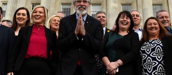 Sinn Fein President Gerry Adams gestures as he and Sinn Fein leader Michelle O'Neill introduce the new Sinn Fein Assembly team at Parliament buildings in Belfast, Northern Ireland March 6, 2017. - Sputnik International
