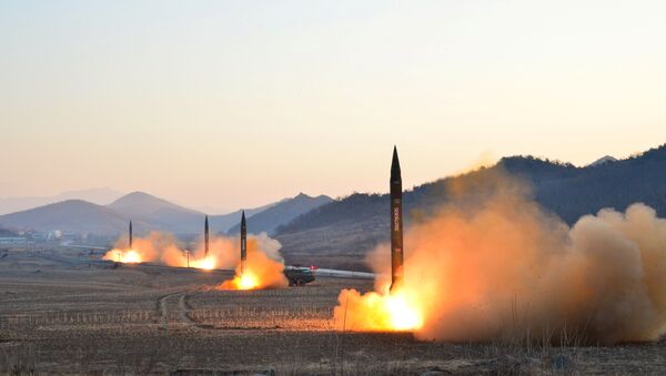 North Korean leader Kim Jong Un supervised a ballistic rocket launching drill of Hwasong artillery units of the Strategic Force of the KPA on the spot in this undated photo released by North Korea's Korean Central News Agency (KCNA) in Pyongyang March 7, 2017 - Sputnik International