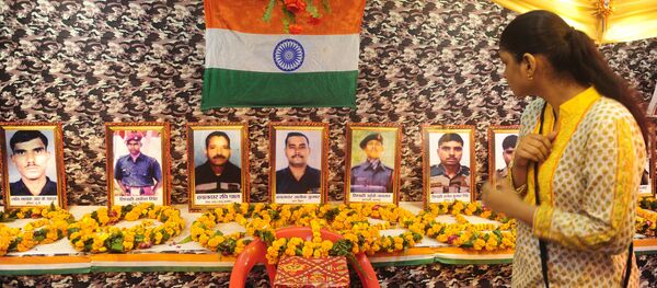 Indian people pay tribute to 18 martyred Indian soldiers, who were killed in a militant attack in Uri near the Line of Control (LoC) on 18 September, at a Durga Puja Panda Shastri Nagar in Allahabad on October 9, 2016 Indian people pay tribute to 18 martyred Indian soldiers, who were killed in a militant attack in Uri near the Line of Control (LoC) on 18 September, at a Durga Puja Panda Shastri Nagar in Allahabad on October 9, 2016 - Sputnik International