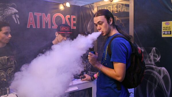 A visitor to RusskiVape, the third professional vape industry expo in Moscow - Sputnik International