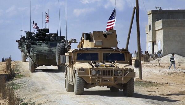  This Tuesday, March 7, 2017 frame grab from video provided by Arab 24 network, shows U.S. forces patrol on the outskirts of the Syrian town, Manbij, a flashpoint between Turkish troops and allied Syrian fighters and U.S.-backed Kurdish fighters, in al-Asaliyah village, Aleppo province, Syria - Sputnik International