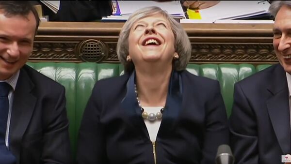 Watch: British PM Theresa May laughs 'like a supervillain' at PMQs - Sputnik International