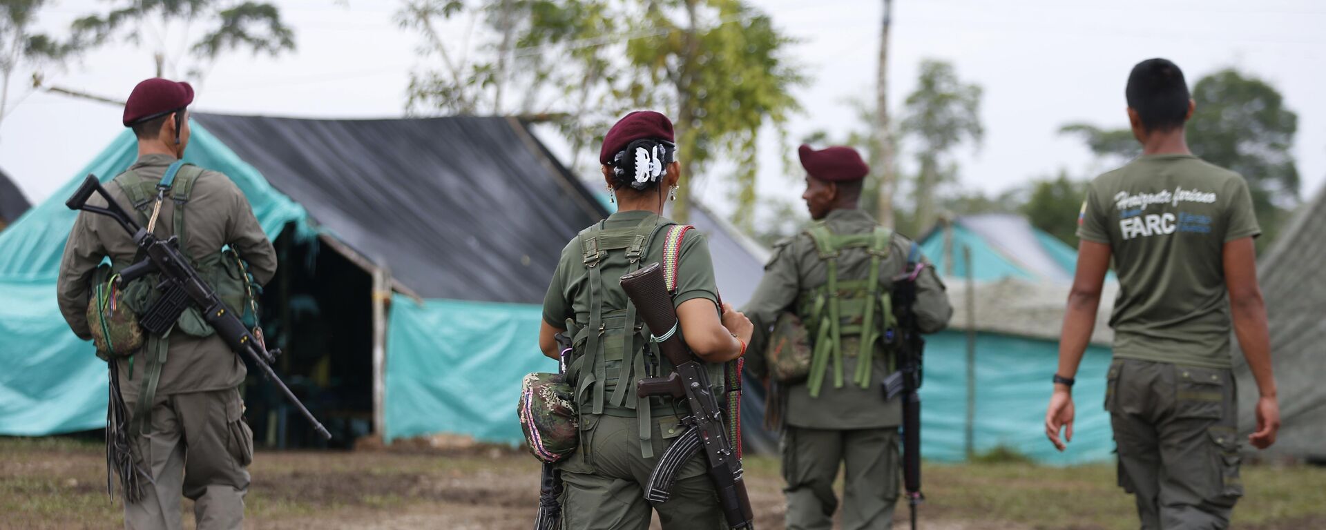 Revolutionary Armed Forces of Colombia, FARC, rebels walk in their camp in La Carmelita near Puerto Asis in Colombia's southwestern state of Putumayo, Tuesday, Feb. 28, 2017 - Sputnik International, 1920, 30.11.2021