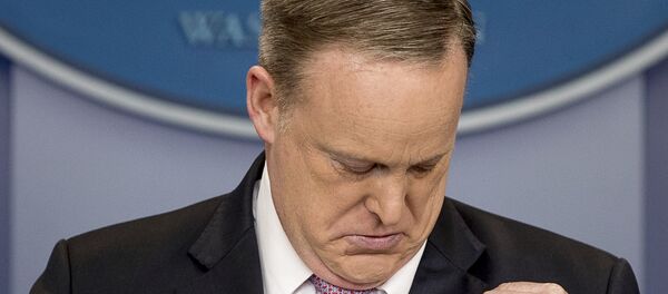White House Press Secretary Sean Spicer speaks to media while his American flag lapel pin is upside down White House Press Secretary Sean Spicer speaks to media while his American flag lapel pin is upside down - Sputnik International