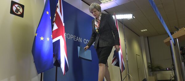 British Prime Minister Theresa May leaves after a press conference during a European Summit at the EU headquarters in Brussels on March 9, 2017 - Sputnik International