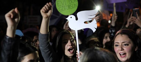 Greek Cypriots and Turkish Cypriots participate in a peace rally marking the international Women's Day inside the UN-controlled buffer zone of Nicosia, Cyprus March 8, 2017 Greek Cypriots and Turkish Cypriots participate in a peace rally marking the international Women's Day inside the UN-controlled buffer zone of Nicosia, Cyprus March 8, 2017 - Sputnik International
