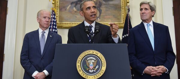 US President Barack Obama speaks on the Keystone XL pipeline, flanked by Secretary of State John Kerry (R), and Vice President Joe Biden, on November 6, 2015 in the Roosevelt Room of the White House in Washington, DC. US President Barack Obama speaks on the Keystone XL pipeline, flanked by Secretary of State John Kerry (R), and Vice President Joe Biden, on November 6, 2015 in the Roosevelt Room of the White House in Washington, DC. - Sputnik International