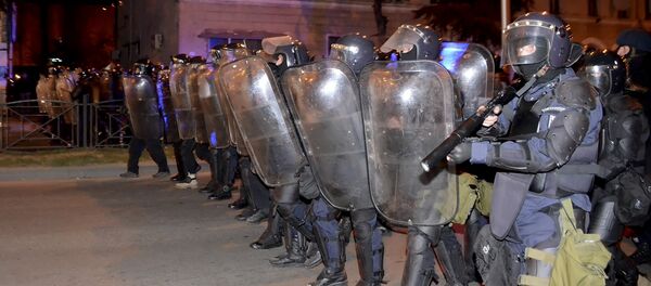 Riot police make a line during riots in the Georgian Black Sea port of Batumi, early Sunday, March 12, 2017. - Sputnik International