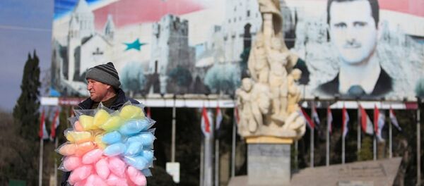 Syrian man at the one of the street in Aleppo Syrian man at the one of the street in Aleppo - Sputnik International