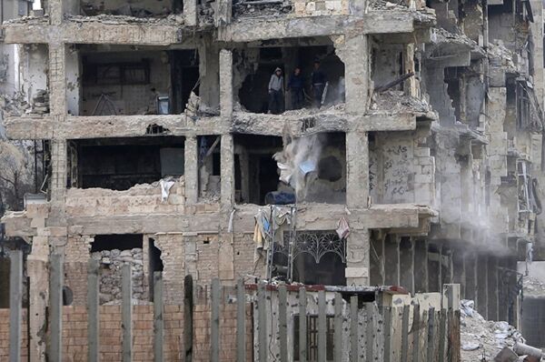 Damaged building in Aleppo - Sputnik International