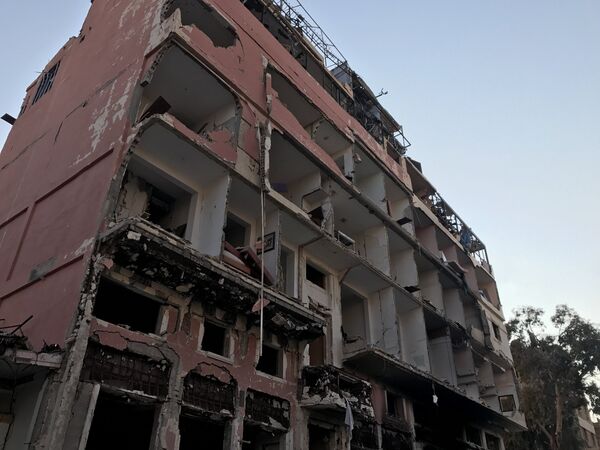 Buildings destroyed during combat activities in the residential part of Ancient Palmyra in Homs Governorate, Syria - Sputnik International