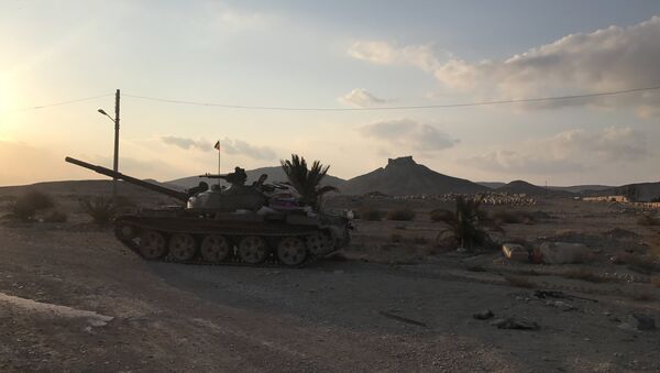 A T-62 tank is seen here in the environs of Ancient Palmyra in Homs Governorate, Syria - Sputnik International