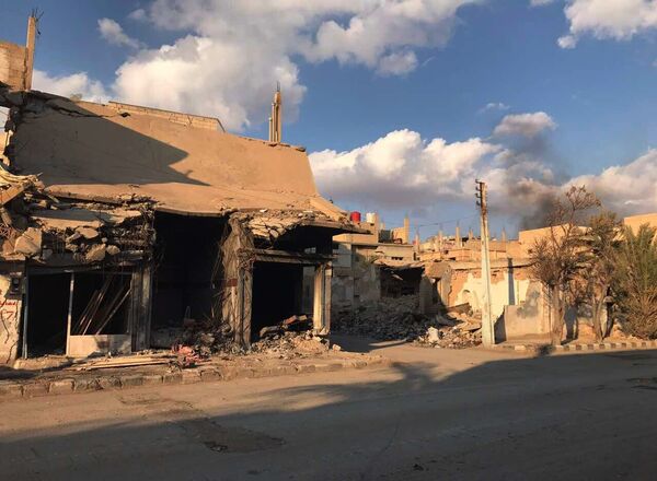 Buildings destroyed during combat activities in the residential part of Ancient Palmyra in Homs Governorate, Syria - Sputnik International