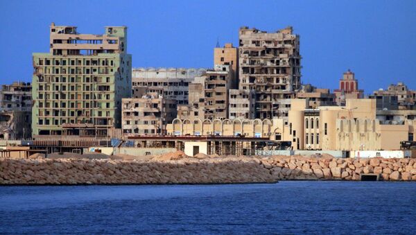 A picture taken on a boat of Libyan naval forces during a patrol shows a view of buildings, including abandoned Omar Khayyam hotel, in the port district in Libya's second city Benghazi on November 20, 2016 - Sputnik International