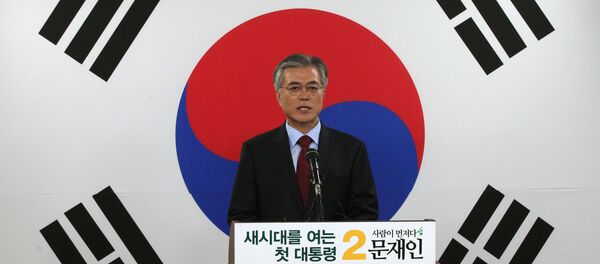 Opposition Democratic United Party's presidential candidate Moon Jae-in speaks in front of a national flag during a press conference at the party's headquarters in Seoul, South Korea. (File) Opposition Democratic United Party's presidential candidate Moon Jae-in speaks in front of a national flag during a press conference at the party's headquarters in Seoul, South Korea. (File) - Sputnik International