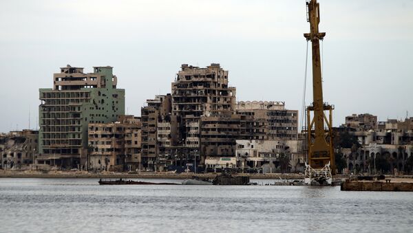 A general view shows destroyed buildings in Libya's eastern coastal city of Benghazi (file) - Sputnik International