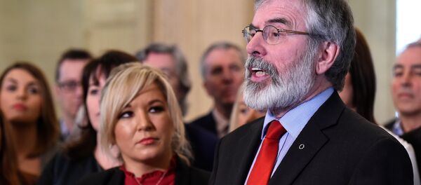 Sinn Fein leader Michelle O'Neill and Sinn Fein President Gerry Adams speak to media and introduce the new Sinn Fein Assembly team at Parliament buildings in Belfast, Northern Ireland March 6, 2017. Sinn Fein leader Michelle O'Neill and Sinn Fein President Gerry Adams speak to media and introduce the new Sinn Fein Assembly team at Parliament buildings in Belfast, Northern Ireland March 6, 2017. - Sputnik International