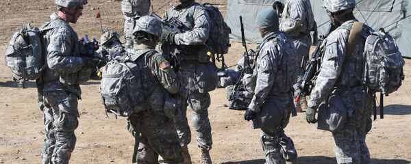 US soldiers gather during their drill at a military training field in the border city of Paju on March 7, 2017. US soldiers gather during their drill at a military training field in the border city of Paju on March 7, 2017. - Sputnik International