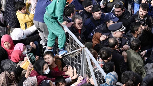 Migrants block the entrance of the Hellinikon camp in Athens in protest at poor living conditions on February 6, 2017 - Sputnik International