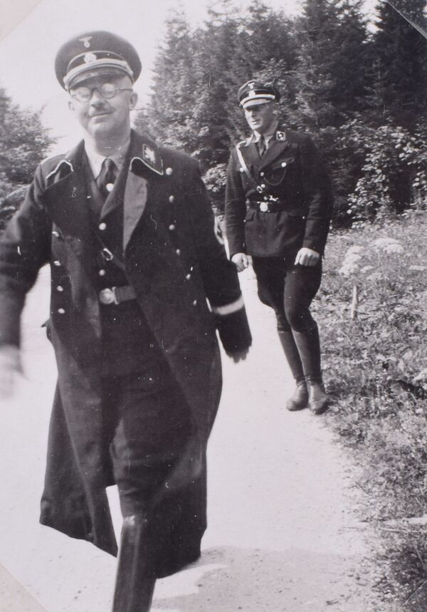 Reichsführer SS Heinrich Himmler smiles at the camera Reichsführer SS Heinrich Himmler smiles at the camera - Sputnik International