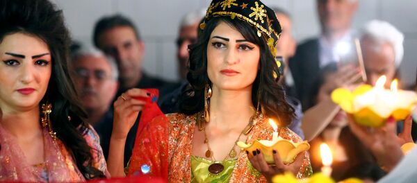 Syrian-Kurdish women model traditional Kurdish attire during a fashion show in the northeastern Syrian city of Qamishli on March 10, 2017, which coincides with the Day of Kurdish Clothing. Syrian-Kurdish women model traditional Kurdish attire during a fashion show in the northeastern Syrian city of Qamishli on March 10, 2017, which coincides with the Day of Kurdish Clothing. - Sputnik International
