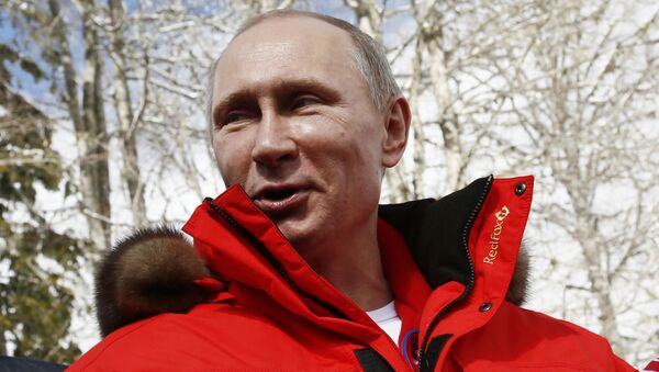 Russian President Vladimir Putin speaks during his meeting with Russian athletes, winners of the cross country 4x2.5km open relay, at the 2014 Winter Paralympic, Saturday, March 15, 2014, in Krasnaya Polyana, Russia. (File) - Sputnik International