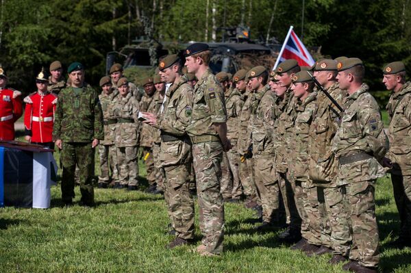 Britain's Prince Harry attends a special ceremony with presentation of the British Certificates of Commendation to Estonian servicemen during NATO's Spring Storm exercise in Otepaa, Estonia, Saturday, May 17, 2014. Britain's Prince Harry attends a special ceremony with presentation of the British Certificates of Commendation to Estonian servicemen during NATO's Spring Storm exercise in Otepaa, Estonia, Saturday, May 17, 2014. - Sputnik International