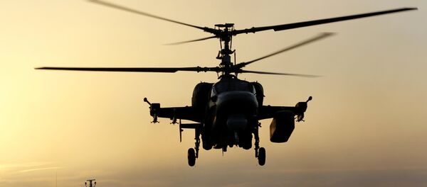 Ka-52K helicopter takes off from the deck of Admiral Kuznetsov heavy aircraft carrier in the Mediterranean Sea Ka-52K helicopter takes off from the deck of Admiral Kuznetsov heavy aircraft carrier in the Mediterranean Sea - Sputnik International