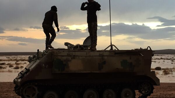 Jordanian soldiers take a break on their armored vehicle (File) - Sputnik International