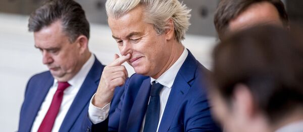 Dutch PVV leader Geert Wilders is seen prior to a meeting between main parties leaders and the Chairman of the Senate in The Hague, on March 16, 2017, one day after the general elections Dutch PVV leader Geert Wilders is seen prior to a meeting between main parties leaders and the Chairman of the Senate in The Hague, on March 16, 2017, one day after the general elections - Sputnik International