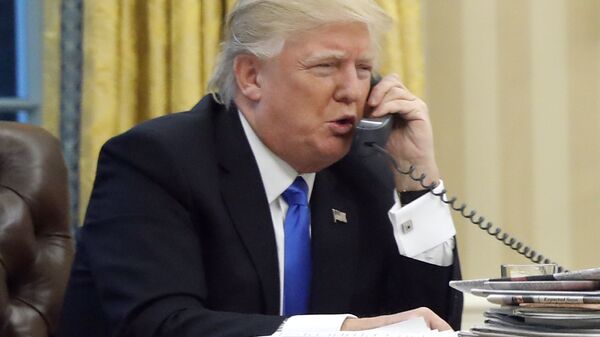 US President Donald Trump speaks on the phone - Sputnik International