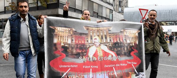 People attend a pro-Kurdish demonstration in Cologne, western Germany, on November 5, 2016 as part of an international day in support to Kurds - Sputnik International