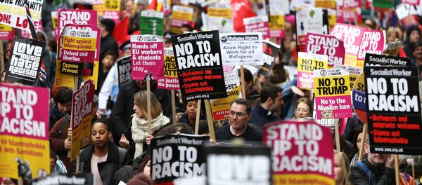 Protestors take part in a demonstration against racism in London, Britain, March 18, 2017 Protestors take part in a demonstration against racism in London, Britain, March 18, 2017 - Sputnik International