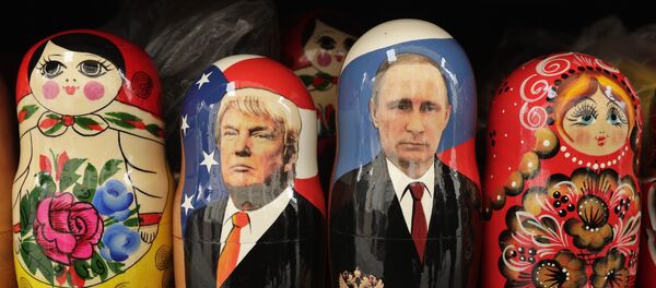 In this Monday, Feb. 20, 2017 traditional Russian wooden dolls called Matryoshka depicting US President Donald Trump, centre left and Russian President Vladimir Putin are displayed for sale at a souvenir street shop in St.Petersburg, Russia In this Monday, Feb. 20, 2017 traditional Russian wooden dolls called Matryoshka depicting US President Donald Trump, centre left and Russian President Vladimir Putin are displayed for sale at a souvenir street shop in St.Petersburg, Russia - Sputnik International