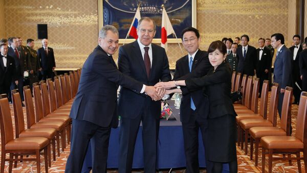 From left: Russian Defense Minister Sergei Shoigu, Russian Foreign Minister Sergei Lavrov, Japanese Foreign Minister Fumio Kishida and Japanese Defense Minister Tomomi Inada during two-plus-two talks between defense and foreign ministers of Japan and Russia, in Tokyo. - Sputnik International