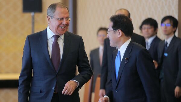 Japanese Foreign Minister Fumio Kishida and Russian Foreign Minister Sergei Lavrov, left, during a meeting held as part of Lavrov's visit to Japan. - Sputnik International
