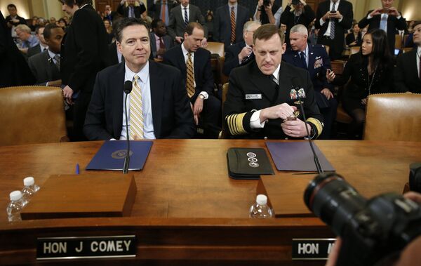 FBI Director James Comey (L) and National Security Agency Director Mike Rogers take their seats at a House Intelligence Committee hearing into alleged Russian meddling in the 2016 U.S. election, on Capitol Hill in Washington, U.S FBI Director James Comey (L) and National Security Agency Director Mike Rogers take their seats at a House Intelligence Committee hearing into alleged Russian meddling in the 2016 U.S. election, on Capitol Hill in Washington, U.S - Sputnik International