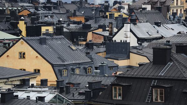 View of Stockholm's old town rooftops from top of a building at the Riddarholmen island in Sweden´s capital  - Sputnik International
