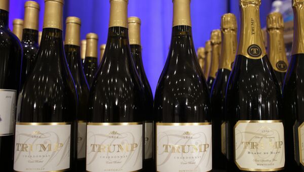 Trump branded wine is displayed prior to a scheduled news conference by Republican presidential candidate Donald Trump, Tuesday, March 8, 2016 - Sputnik International