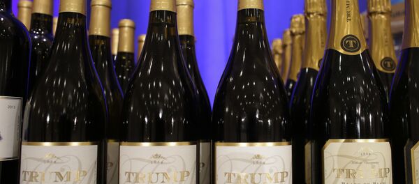 Trump branded wine is displayed prior to a scheduled news conference by Republican presidential candidate Donald Trump, Tuesday, March 8, 2016 - Sputnik International