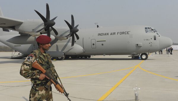 An Indian soldier stands guard in front of the first of the six C-130J Super Hercules, a US military aircraft manufactured by Lockheed Martin. (File) - Sputnik International